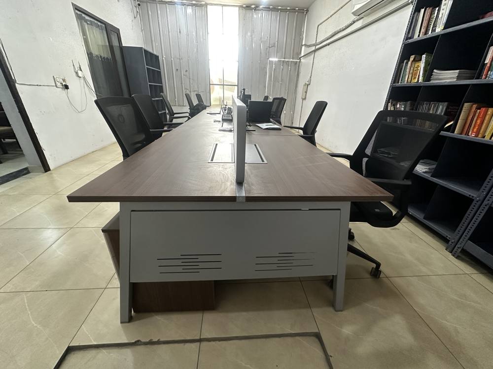 Front view of the desk with metal modesty panel